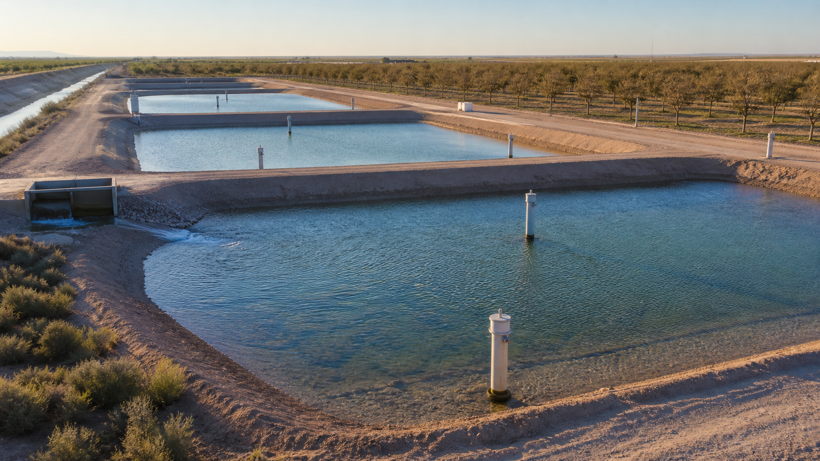 Aquifer recharge basins with monitoring wells